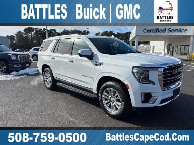 2024 GMC Yukon SLT in Summit White — front three-quarter view