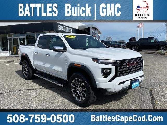 2023 GMC Canyon 4WD Denali in Summit White — front three-quarter view
