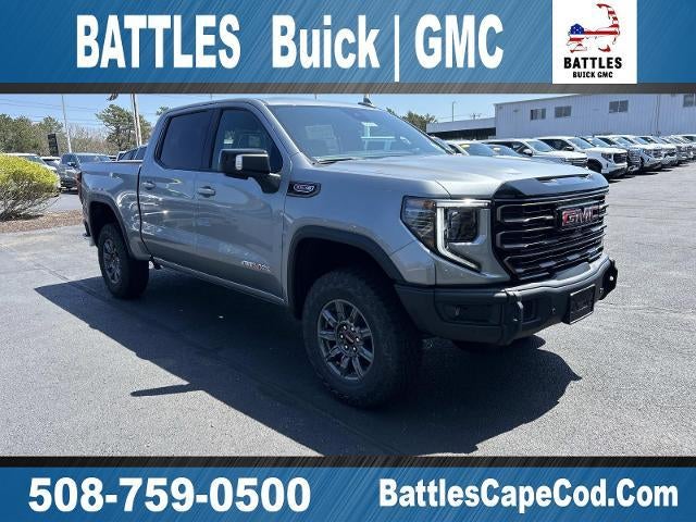 2026 GMC Sierra 1500 AT4X in Sterling Metallic — front three-quarter view