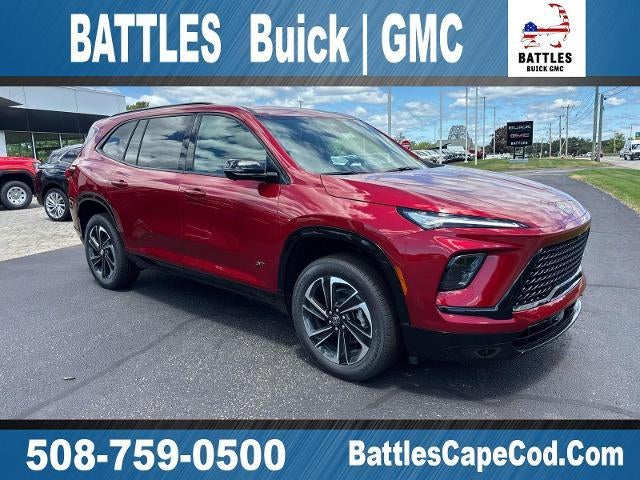 2026 Buick Enclave Sport Touring in Cherry Red Tintcoat — front three-quarter view